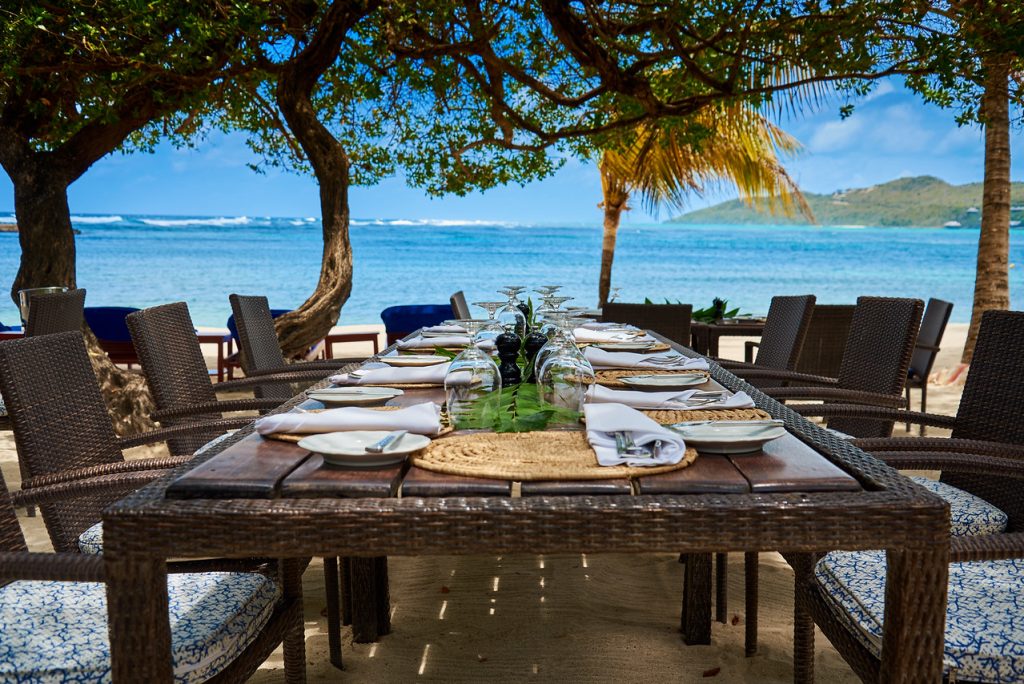 Beachfront Dining at Canouan Estate Resort & Villas. Luxury Villa Resort St Vincent & The Grenadines. 